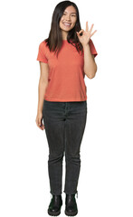 Full-body young Chinese woman cheerful and confident showing ok gesture.