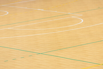 Wooden floor basketball, badminton, futsal, handball, volleyball, football, soccer court. Wooden floor of sports hall with marking lines on wooden floor indoor, gym court