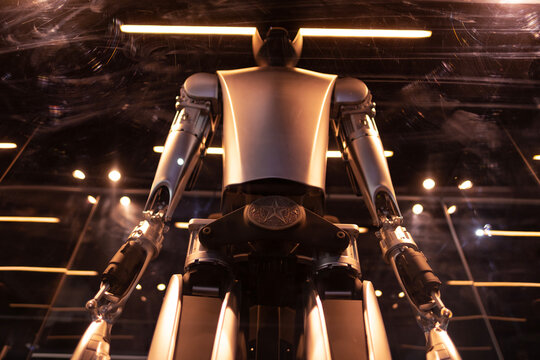 futuristic humanoid robot named Tesla Bot Optimus, artificial intelligence in Gigafactory Berlin-Brandenburg Tesla manufacturing plant, Berlin, Germany - April 26, 2024