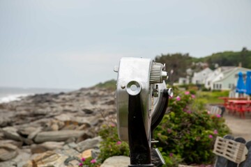 Viewfinder on rocky Maine shore
