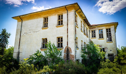 An abandoned, old school building in the village of Tabachka, Bulgaria.