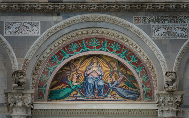 Colorful mosaic in the entrance of a catholic church 