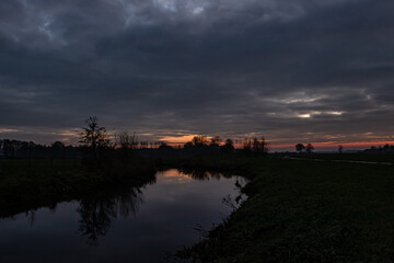Fototapeta premium sunset over the river