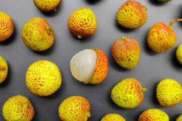 Fresh lychee fruit on white background. Juicy exotic fruit.