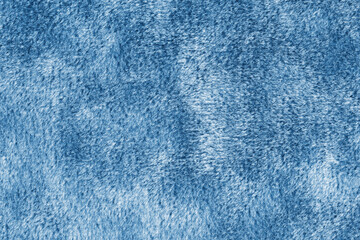 Faux fur texture, fluffy velours blue fabric or cloth, upholstery textile