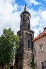 Fototapeta premium black tower of the evangelical church in Lwowek Slaski, Poland
