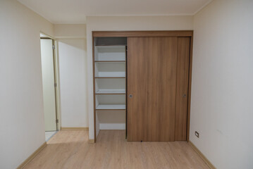 Apartment room with built-in Closet