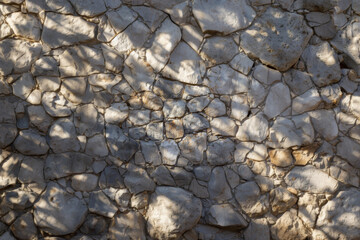 Aerial View of Stone Pavement or Floor, Softly Illuminated by Sunlight, Perfect Texture or Background for Playmats or Maps