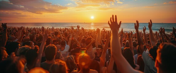 Crowd Celebrates at Beach During Golden Hour Sunset