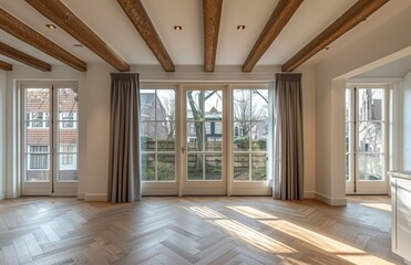 Fototapeta premium Spacious empty living room with large windows and exposed wooden beams