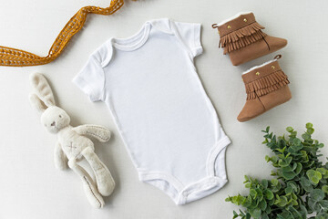 White baby bodysuit vest mockup with Soft Toy and baby booties