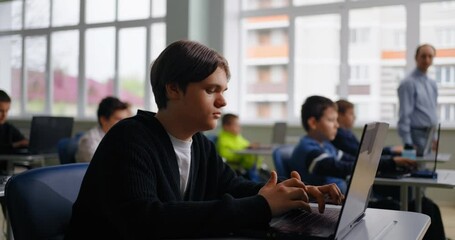 Teen Boy Learning Computer Science In School, Portrait Of Pupil Working With Laptop, Smart Children - Powered by Adobe