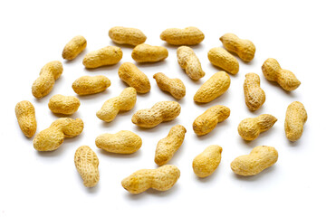 Roasted peanuts in shell on white background.