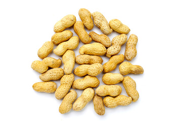 Roasted peanuts in shell on white background.