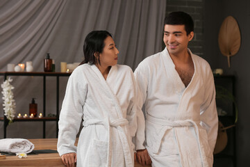 Young couple relaxing in spa salon