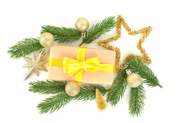 Christmas gift box with fir branches and beautiful decorations on white background