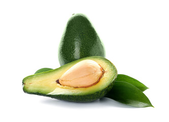 Fresh ripe avocados and leaves on white background