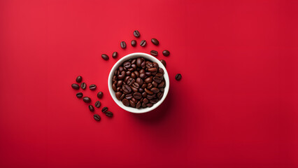 A bowl of coffee beans on a red background