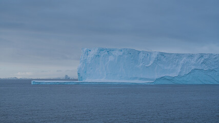 Antarctica Iceberg at Sunset Incredible Wide Large Ice Structure Beautiful Wide Vista. Climate...