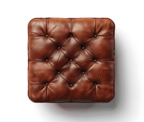 Obraz premium Top view of a square brown leather chair cushion on a white background.