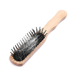 Wooden brush with lost hair isolated on white
