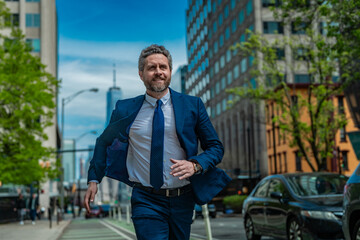 Business man run in NY. American business. Businessman run down street, late for a meeting. Businessman in suit run be success. Running business man. Fast business. Run and late businessman.