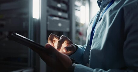 Person, tablet and working in server room as software engineer and information technology in data centre. Developer, hands or email on touchscreen to code or it infrastructure for network programming - Powered by Adobe