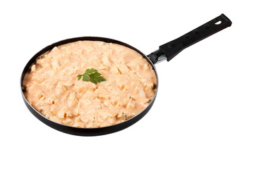 Homemade chicken stroganoff in aluminum pan isolated on white background