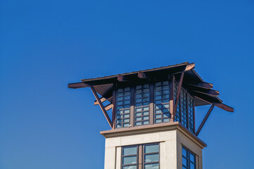 Asian Tower with Blue Sky Overhead.