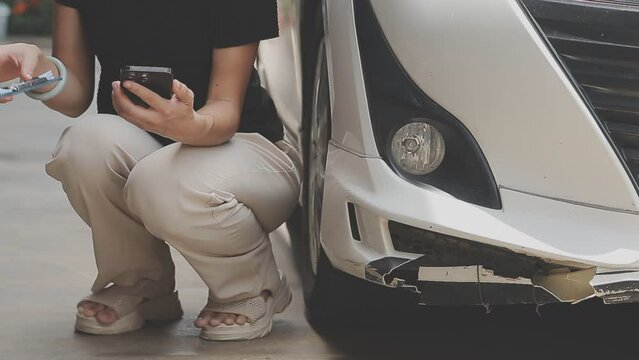 senior man and insurance agent claim process after car crash
