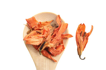 Healthy lily flower tea in wooden spoon on white background with clipping path. dried orange flower day lily on white. herbal teas and flower tea concept