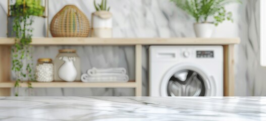 A white marble table top against a blurred backdrop of a modern laundry room interior, with a washing machine and shelf in the back.