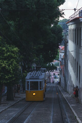 A photo of the yellow tram in Lisbon