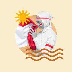 Young muslim woman holding indonesian flag with eyes closed showing patriotism