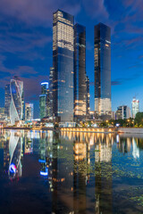 Obraz premium Moscow city at summer night. Modern skyscrapers in Moscow-city downtown. Moscow, Russia