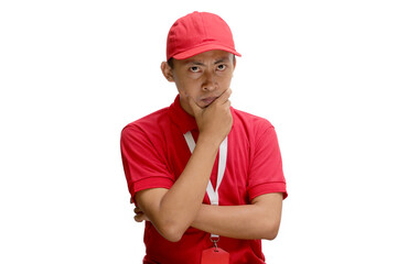 Asian delivery man or courier is deep in thought, putting his hand on his chin in a thinking...