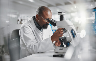 Scientist, development and microscope in laboratory for analysis, innovation and medical research....