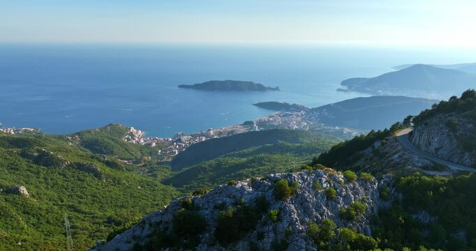 Panoramic drone shot the of Bečići city from the highlands of sunny Montenegro