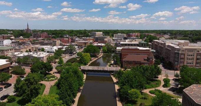 Drone Descends to Reveal DuPage River in Downtown Naperville, Illinois