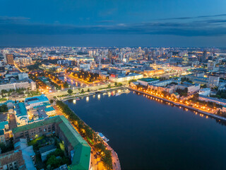 Embankment of the central pond and Plotinka in Yekaterinburg at summer or early autumn night. The historic center of the city of Yekaterinburg, Russia, Aerial View