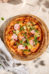 Summer Delight Mortadella and Artichoke Pizza with Arugula in Sunlight and Shadow