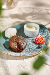 Decadent Chocolate Lava Fondant with Ice Cream in Sunlit Summer Setting