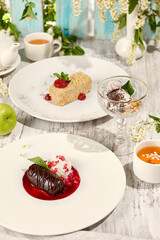 Summer Dessert and Tea with Lilacs in Sunlit Wooden Setting