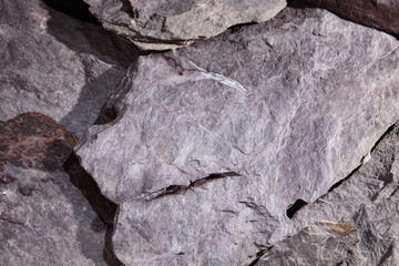 Close-Up of Rocky Cliff Texture with Layered Natural Stone Surface