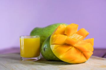 Mango juice with mango slice isolated on white background. glass of mango juice.