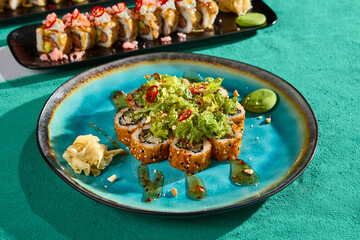 Close-Up of Tempura Roll with Salad Mix and Sweet Chili Sauce on Vibrant Plate