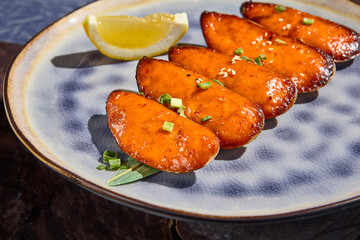 Baked Mussels with Cheese and Lemon Wedge on Ceramic Plate – Gourmet Seafood Delicacy