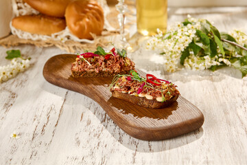 Sunlit Bruschetta with Shredded Beef on Wooden Board – Rustic Food Photography