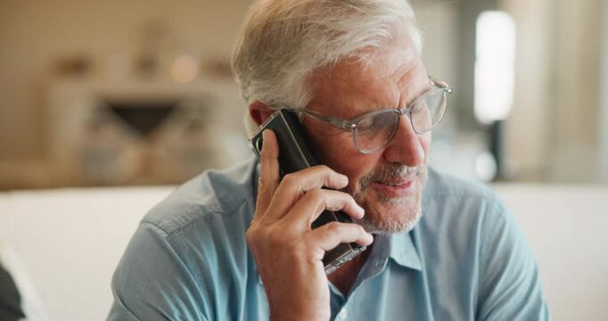 Phone call, talking and senior man on sofa for contact, online chatting and speaking in home. Happy, retirement and person on smartphone for communication, networking and connection in living room