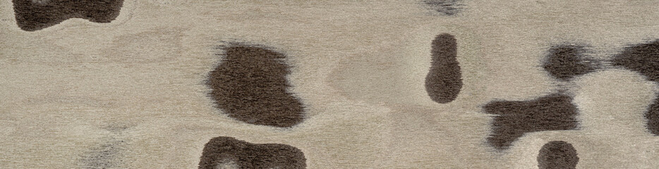 Abstract artistry on a veneer surface with a blend of taupe and espresso swirls